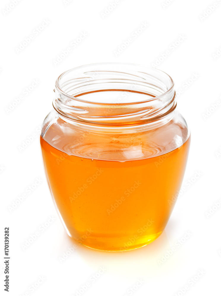 glass jar of honey glass jar of honey