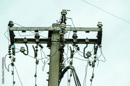 Concrete electric pole with bunch of wires