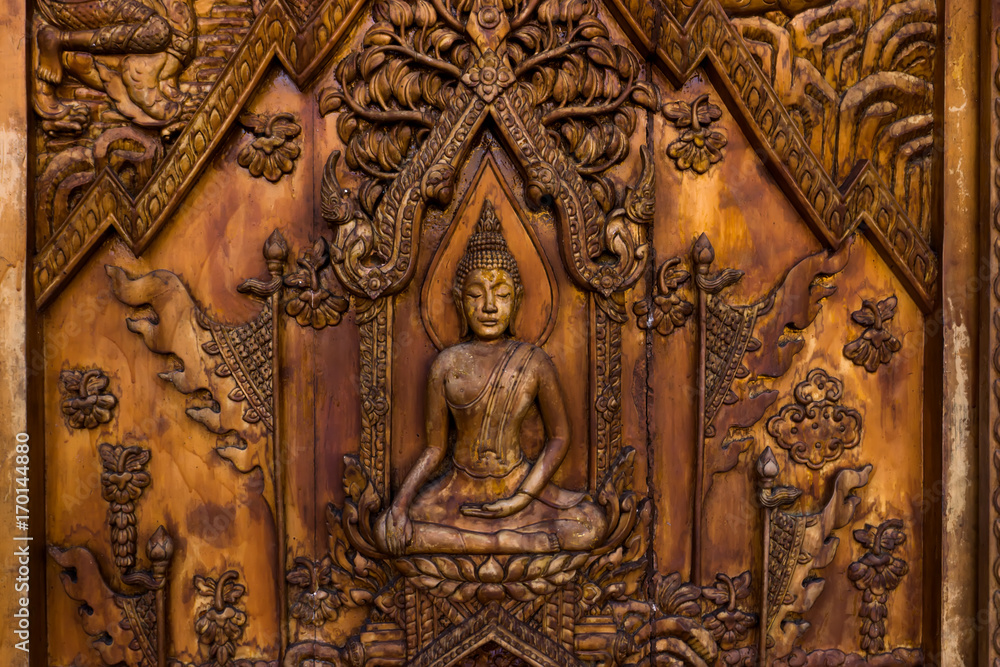 Wood carving of Buddhist history.