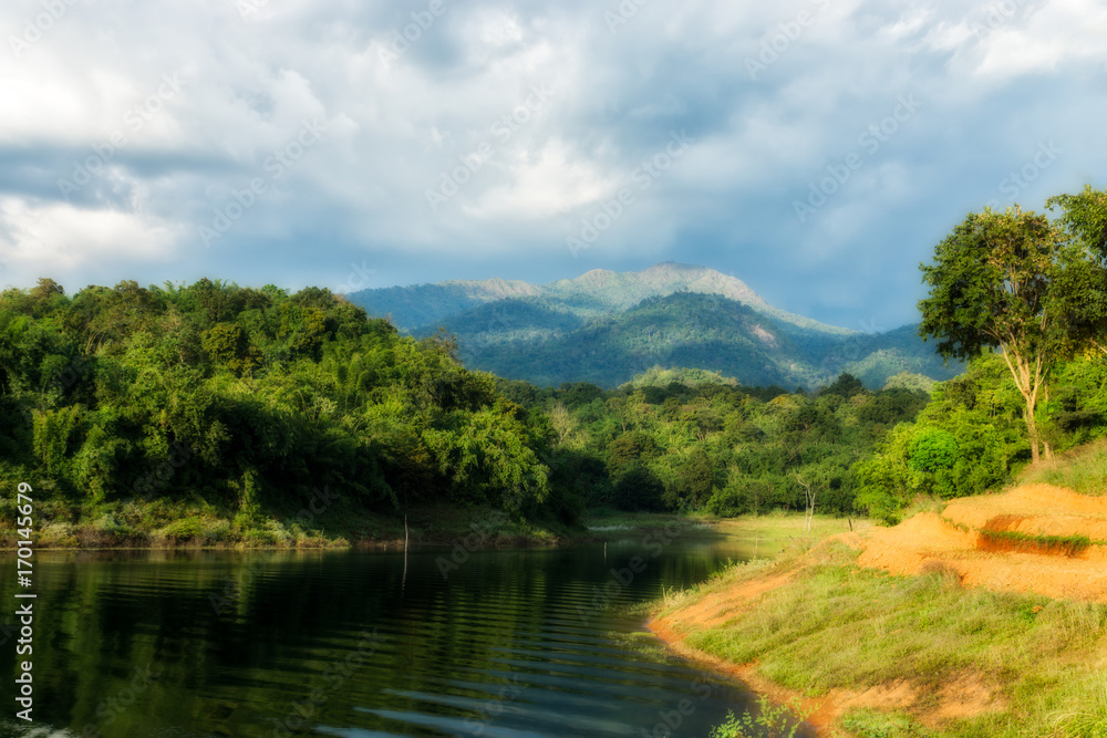 Green mountain with rain cloud.