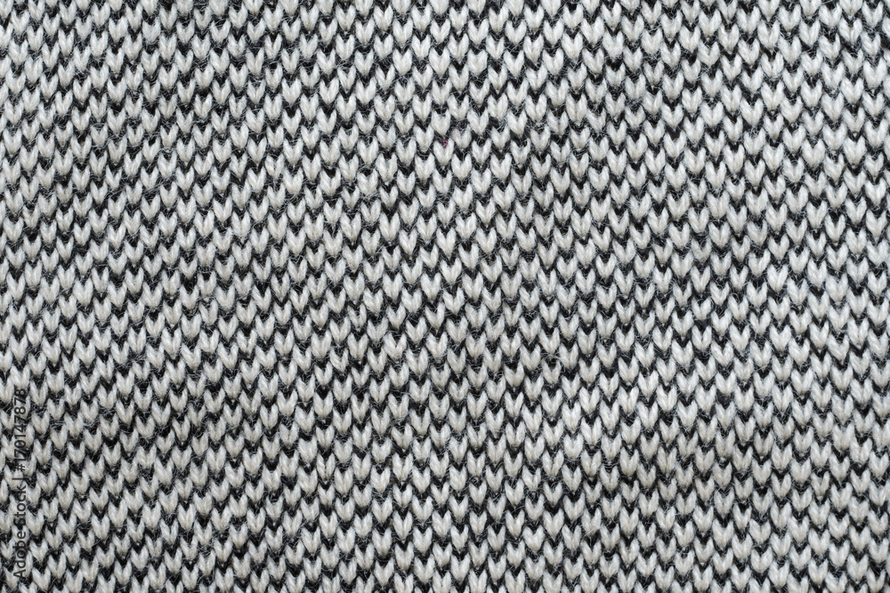 Knitting fabric texture closeup background - black and beige Knitting fabric texture closeup background - black and beige