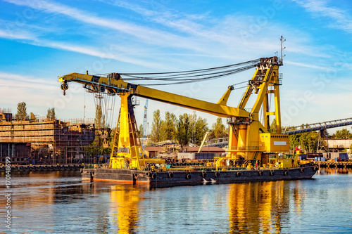 Huge floating crane at work in port of Gdansk, Poland.