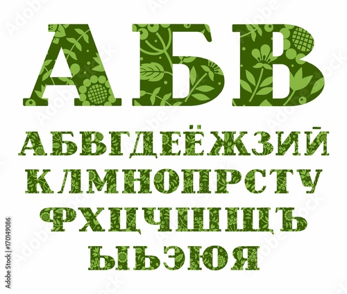Russian alphabet, berries and herbs, green, vector. Capital letters of the Russian alphabet with serif. Green berries, herbs and flowers on a dark green background. 