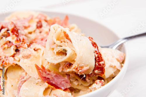 Pappardelle with cream, sun-dried tomatoes and smoked fish