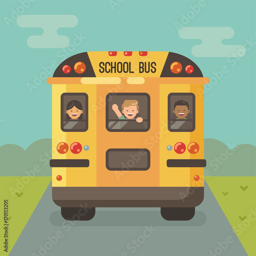 Yellow school bus on the road, back view, with three children looking out the windows, a girl and a two boys. Boy waving hand