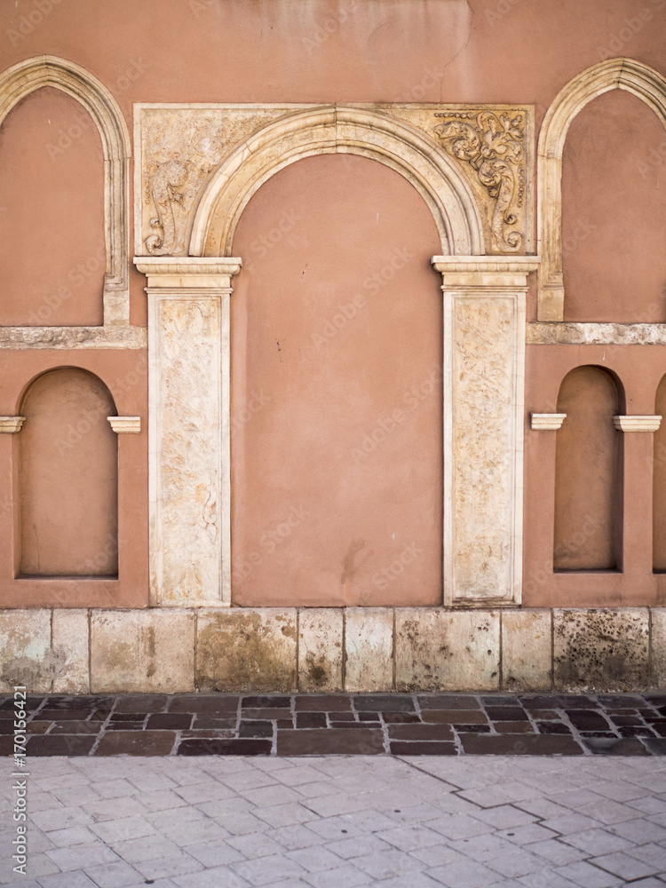 Architectural details, arches, wall, background.