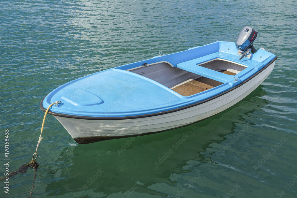 Naklejka premium moored little motorboat 