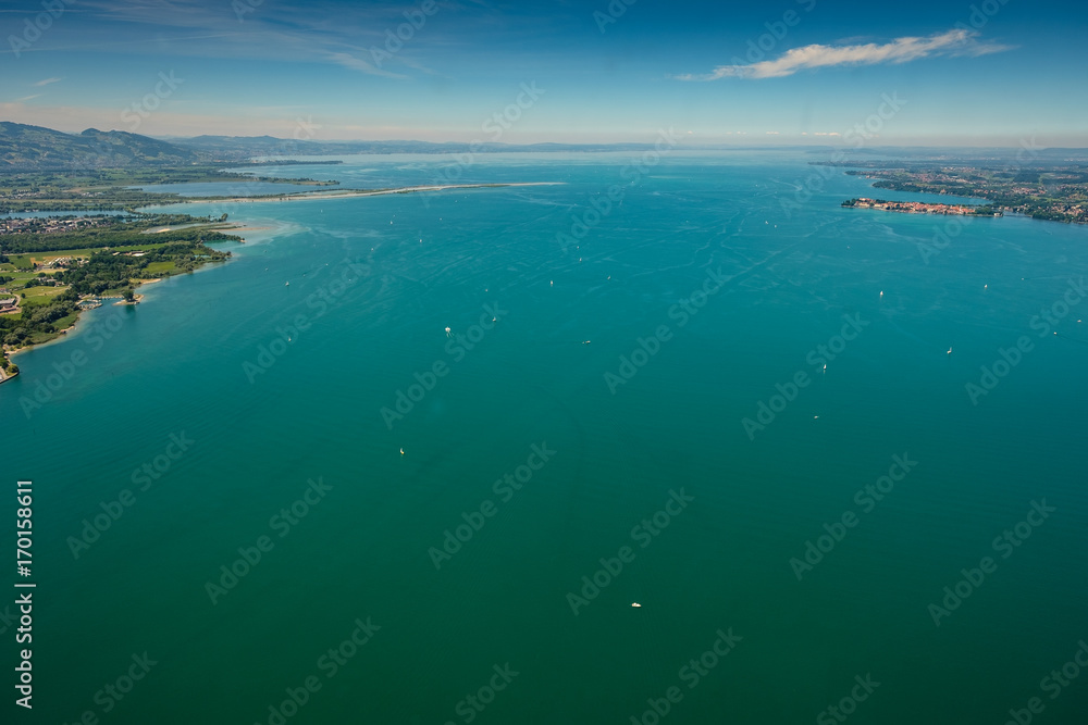 Flugaufnahme vom Bodensee mit Zufluß des Rhein und türkis Wasser Flugaufnahme vom Bodensee mit Zufluß des Rhein und türkis Wasser