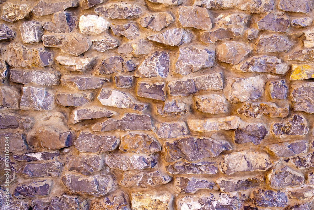 Large masonry. Background The wall of an old fortress Large masonry. Background The wall of an old fortress