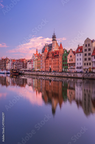 Medieval waterfront reflecting in river, Gdansk, Poland
