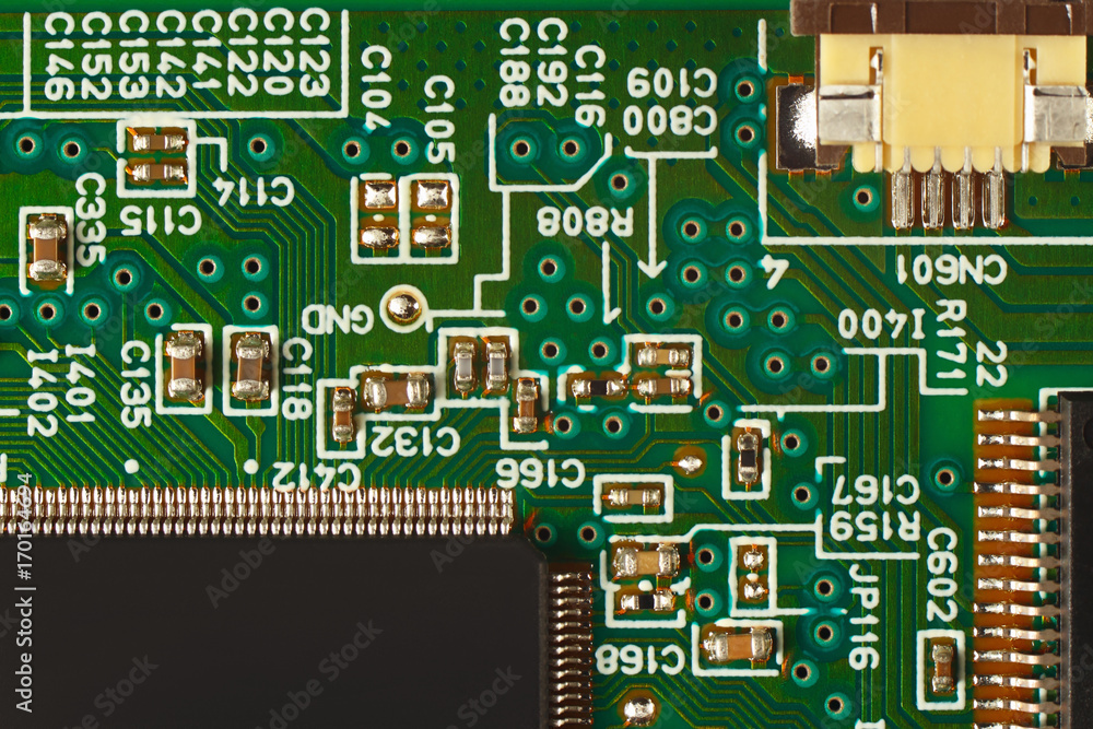 Modern microelectronic circuit board with components close up. Modern microelectronic circuit board with components close up.