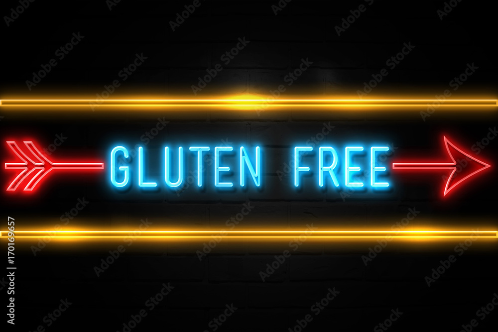 Obraz premium Gluten Free - fluorescent Neon Sign on brickwall Front view