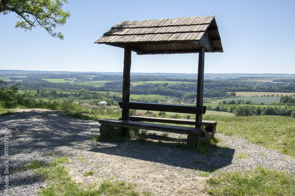 Romantic wooden tourists shelter with seats and table on viewpoint, beautiful landscape, Stremosice, Czech republic Romantic wooden tourists shelter with seats and table on viewpoint, beautiful landscape, Stremosice, Czech republic