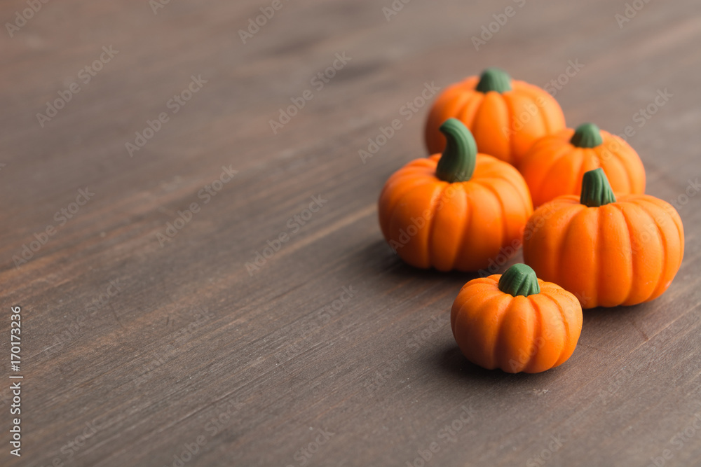 Pumpkins group over wooden background with copy space Pumpkins group over wooden background with copy space