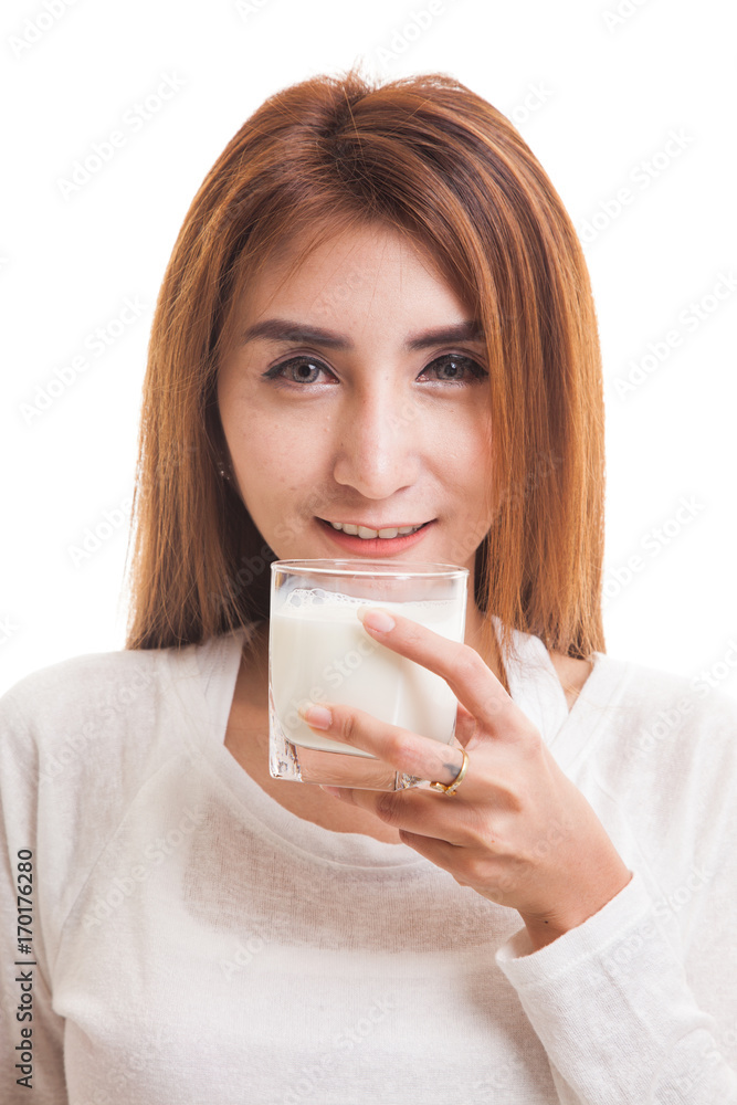 Healthy Asian woman drinking a glass of milk. Healthy Asian woman drinking a glass of milk.