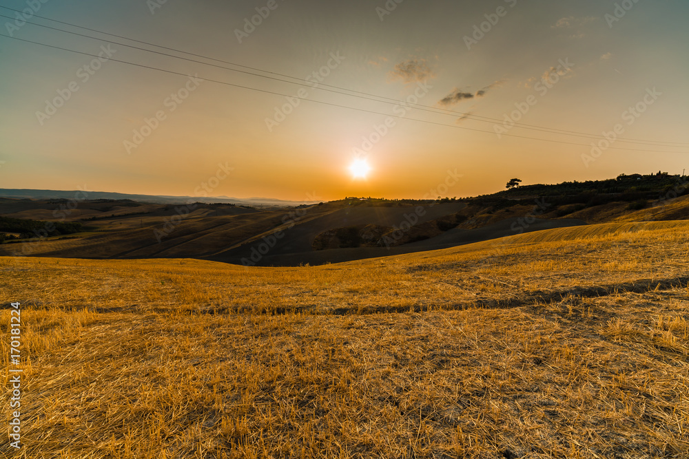 sunset on orange clay countryside