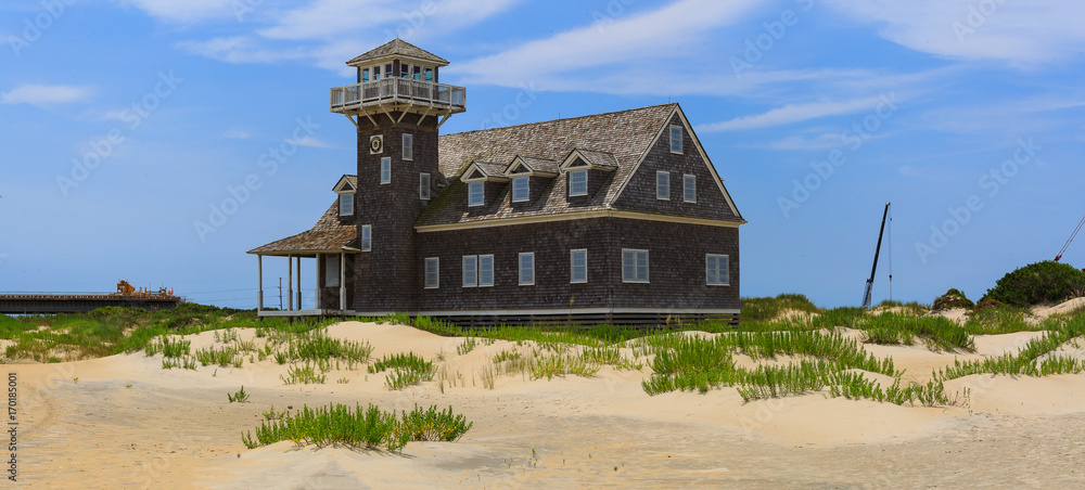 Pea Island Nag's Head NC construction and lighthouse on a summer afternoon Pea Island Nag's Head NC construction and lighthouse on a summer afternoon