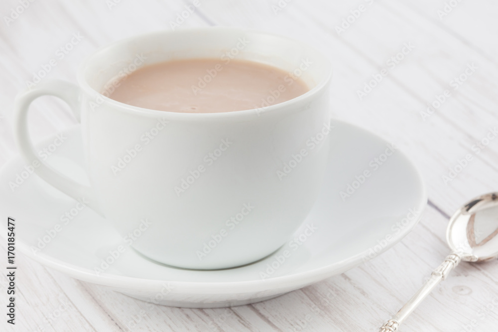 Cup of hot chocolate served in white dishware