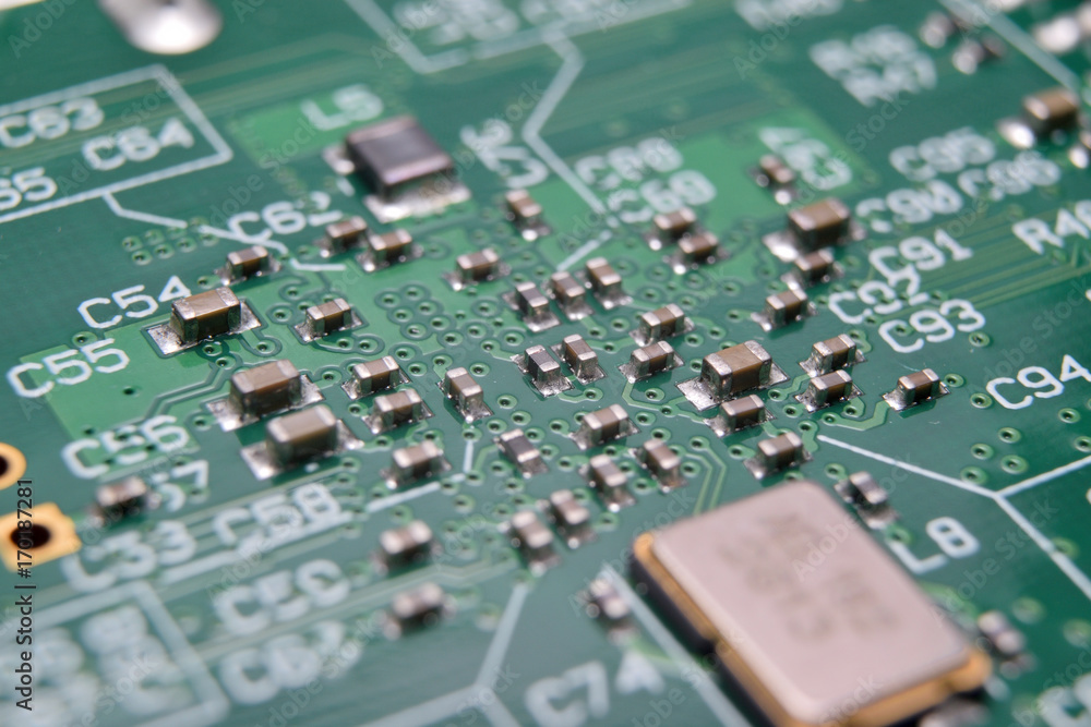 close up of electronic components on pcb board close up of electronic components on pcb board