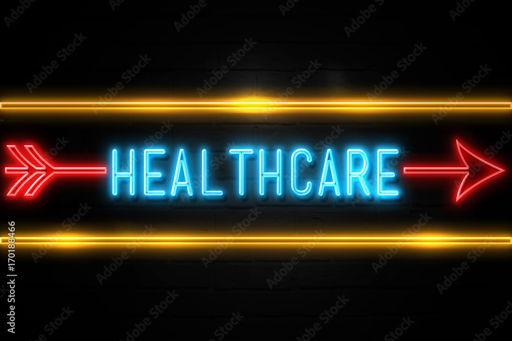 Healthcare  - fluorescent Neon Sign on brickwall Front view