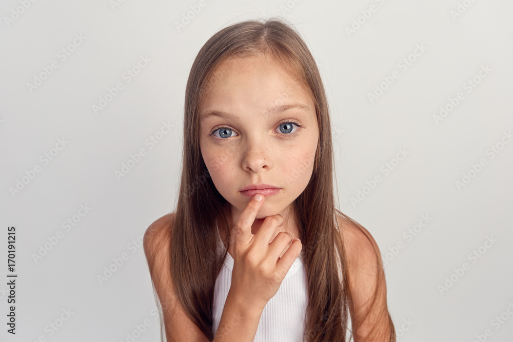 1398906 Little girl on a white background, portrait 1398906 Little girl on a white background, portrait