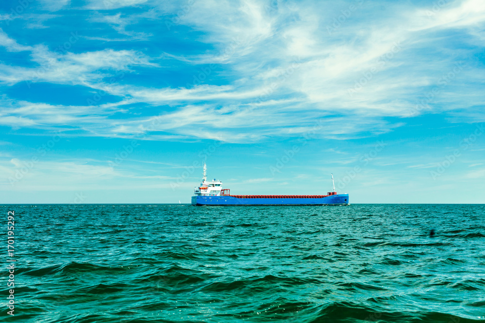 Industrial cargo vessel ship on sea waters Industrial cargo vessel ship on sea waters