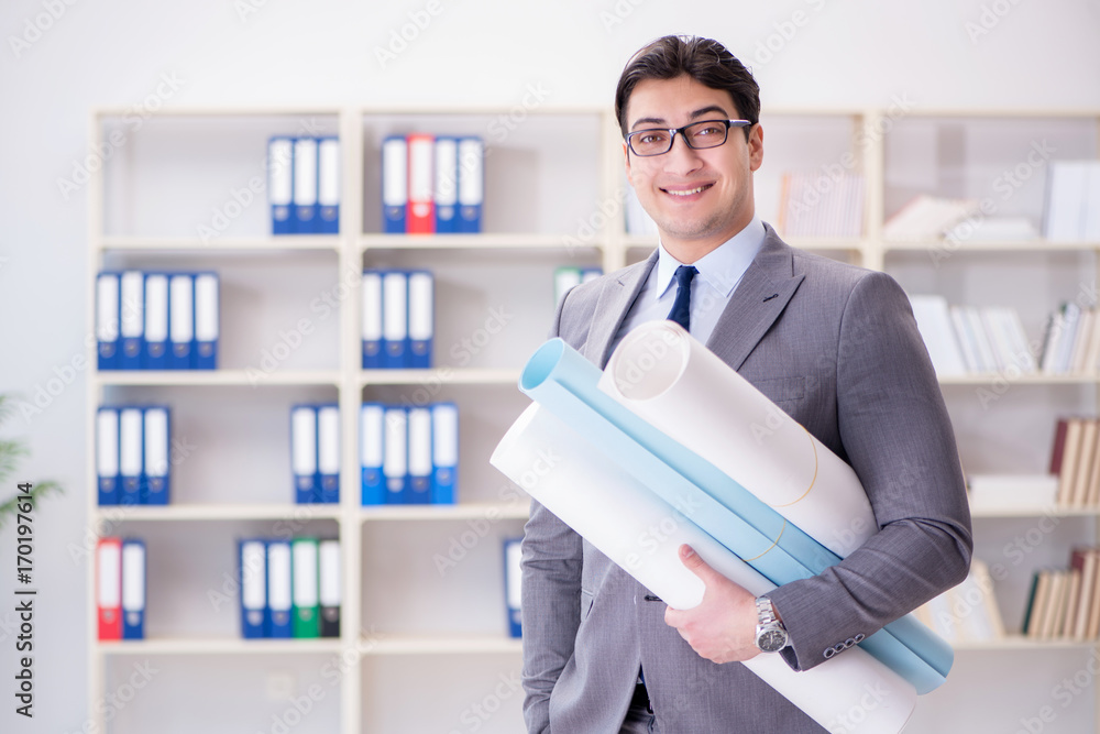 Businessman engineer draftsman with blueprints drawings Businessman engineer draftsman with blueprints drawings