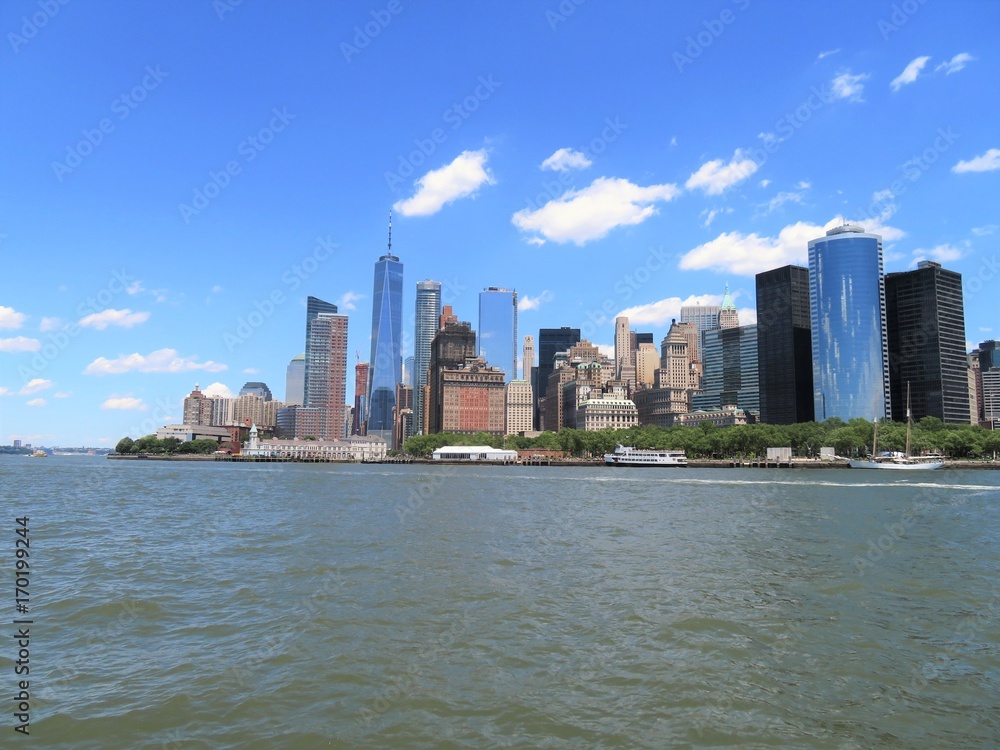Downtown New York City skyline with the Hudson River in the foreground