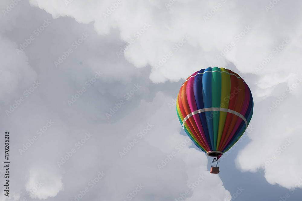 Fototapeta premium Aerostat floating in day sky. Mixed media