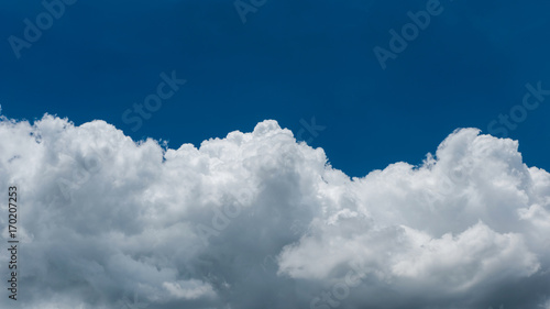 Close-up white cloud with blue sky for nature background