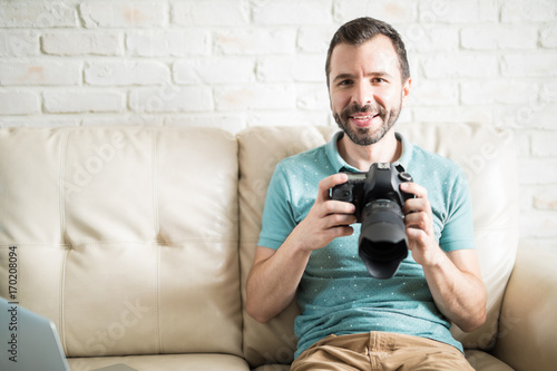 Attractive man with a dslr © AntonioDiaz