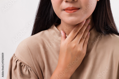 sick woman with sore throat