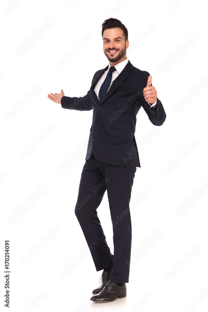 young business man presenting and making the ok hand sign
