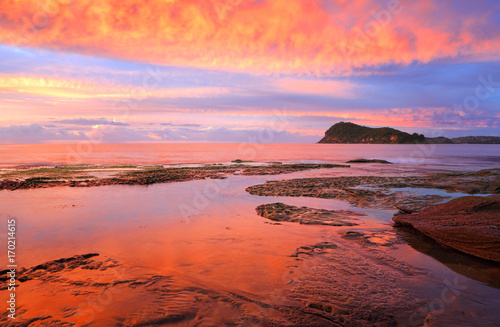 Stunning red sunrise over Lion Island from Pearl Beach © Leah-Anne Thompson