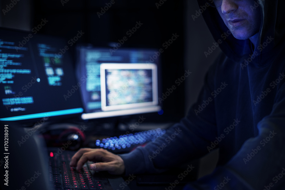 Hacker man working on computer