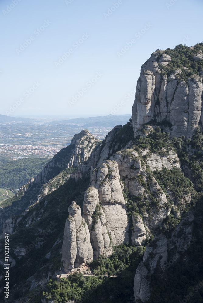 A cross on the top of Montserrat i