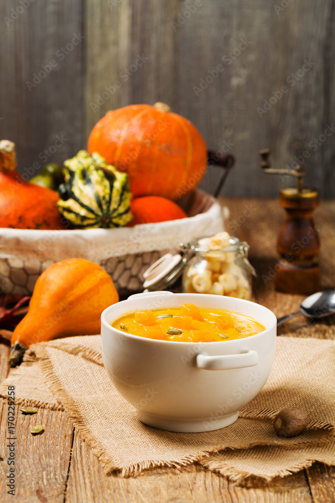soup, cream of pumpkin served with roasted seeds and croutons. soup, cream of pumpkin served with roasted seeds and croutons.