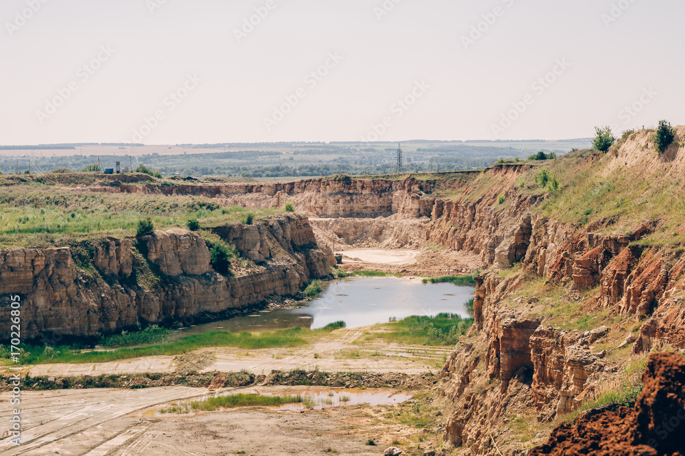 opencast mining quarry, limestone mining, orange mountains