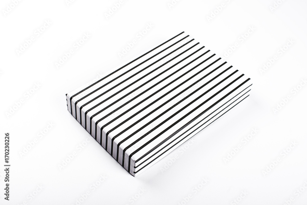 Top view of white box with black racks on white background. Isolated. Top view of white box with black racks on white background. Isolated.