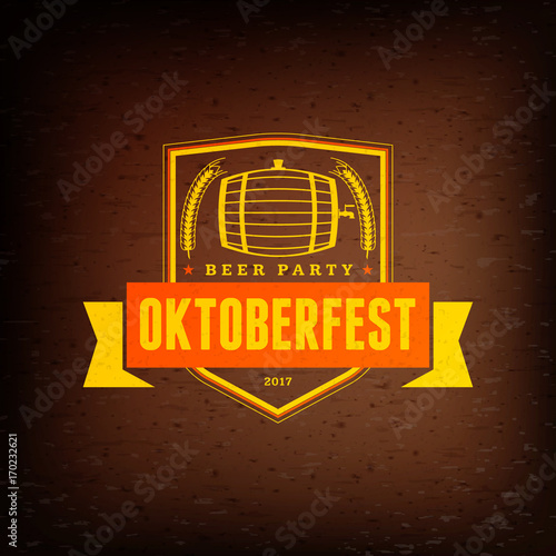 Beer festival Oktoberfest celebrations. Vintage beer label on the brown wooden textured background. Vector design element