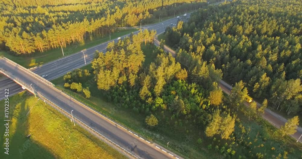 Highway, aerial view of the road junction, traffic on the road.
Highway, aerial view of the road junction, traffic on the road.