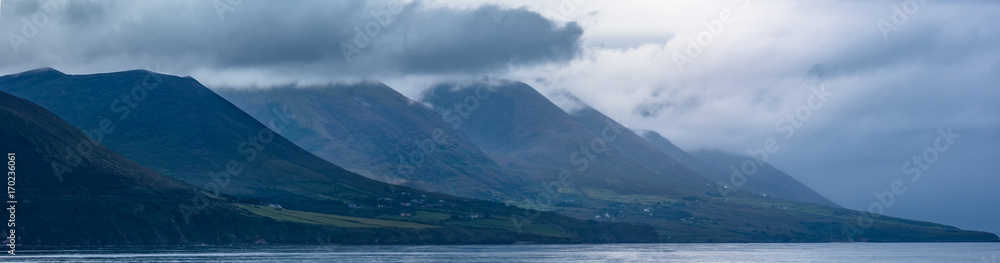 Dark and stormy landscape of the Iveragh Peninsula on the west coast of Ireland