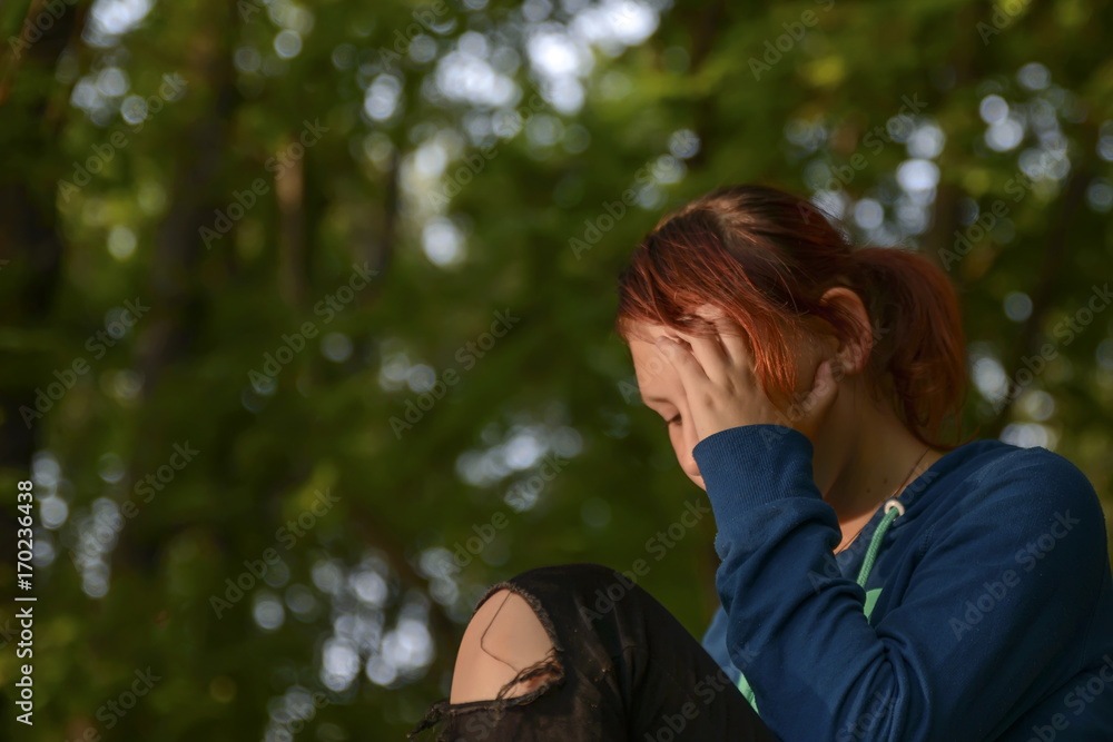 teenager girl thinks about her experiences, alone in the woods teenager girl thinks about her experiences, alone in the woods