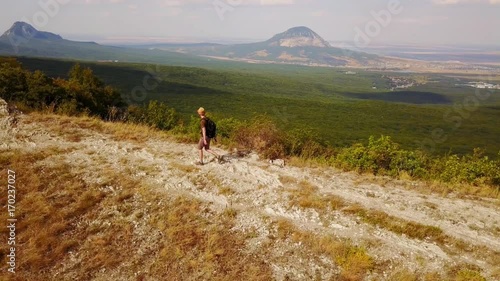 A traveler is hiking in Pyatigorsk in Stavropol region of Russia on the Beshtau mountain photo