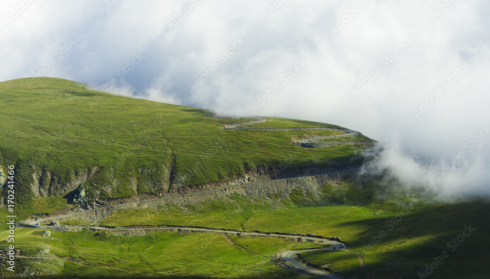 Fototapeta premium curved road in mountain landscape, Transalpina. Romania