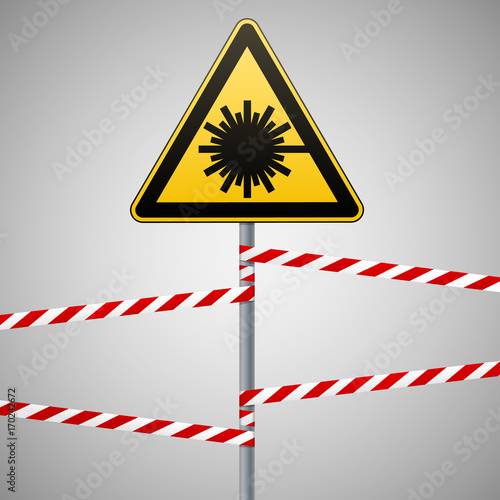 Caution - danger Warning sign safety. Danger, laser radiation. yellow triangle with black image. sign on pole and protecting ribbons. Vector Image.
