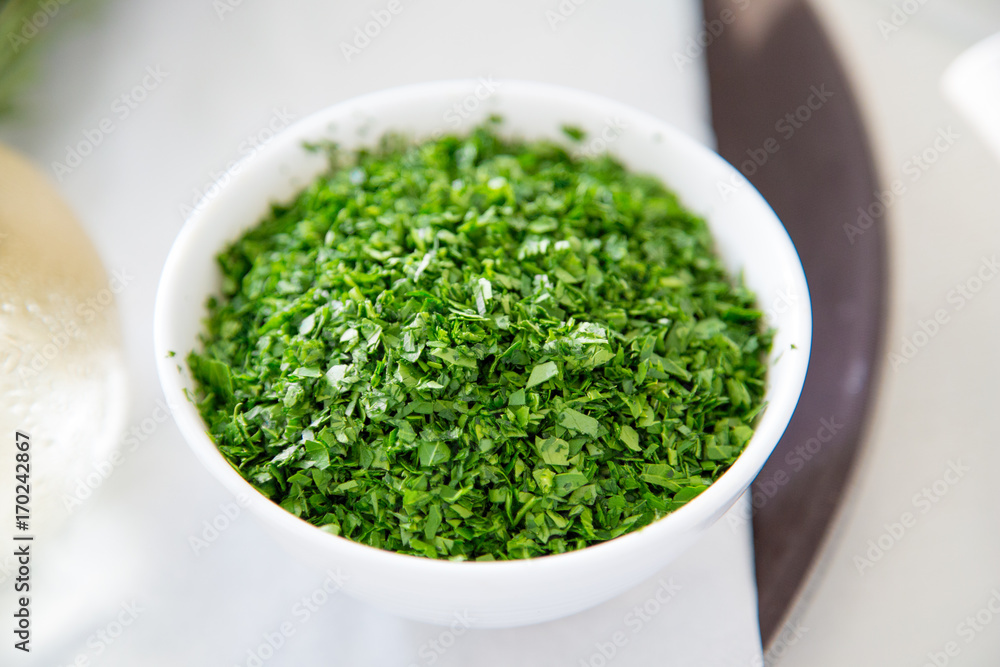 Condiment. Crushed coriander in a bowl. Condiment. Crushed coriander in a bowl.