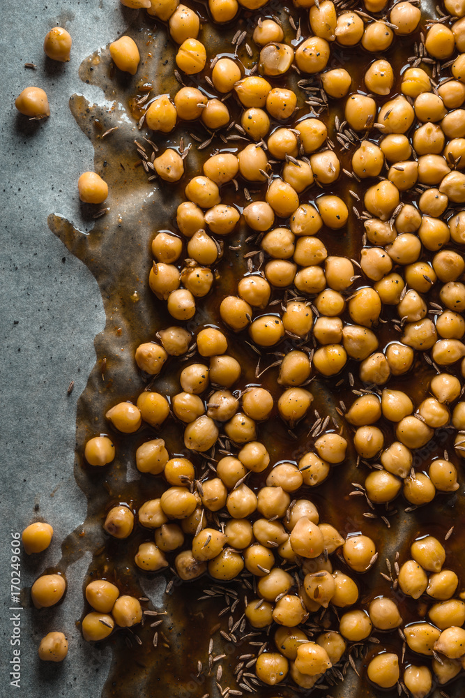 Chickpea with soy sauce on parchment close-up Chickpea with soy sauce on parchment close-up