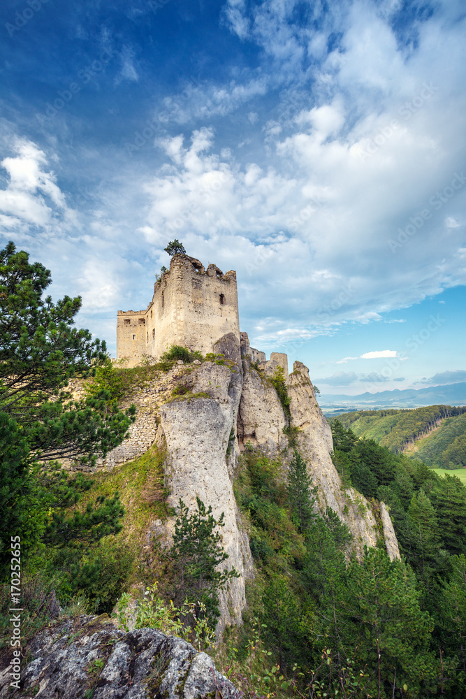 The ruins of a medieval castle Lietava on a rocky blade, nearby Zilina town, Slovakia, Europe.