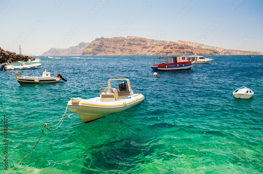 Boats in the port of Santorini island, Greece